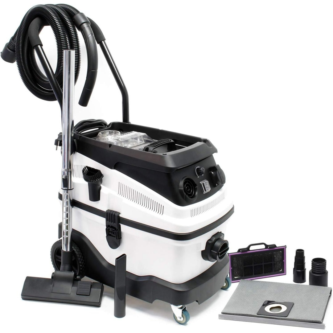 Aspirateur mixte associant l'entretien des surfaces de l'atelier au coloris gris et noir